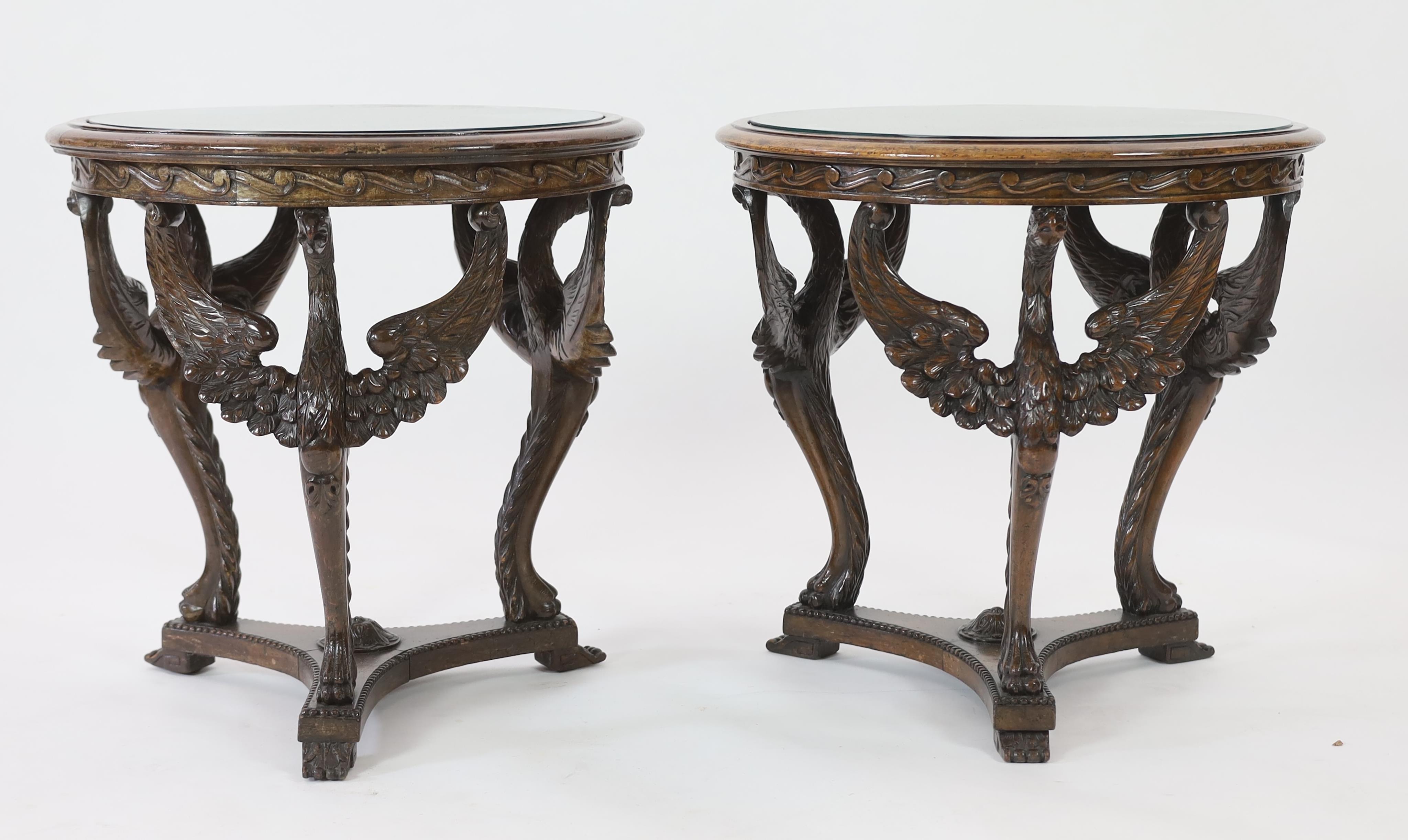 A pair of walnut occasional tables